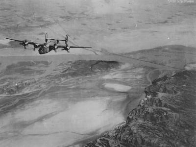 14th AF B-24 over China’s Old Yellow River Bridge 1945