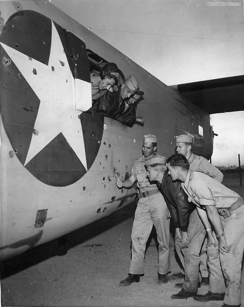514th BS, 376th BG Crew inspecting holes in their B-24 Africa 1942