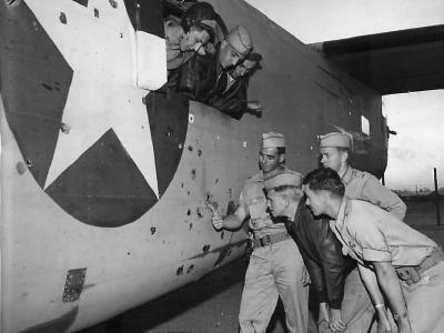 514th BS, 376th BG Crew inspecting holes in their B-24 Africa 1942