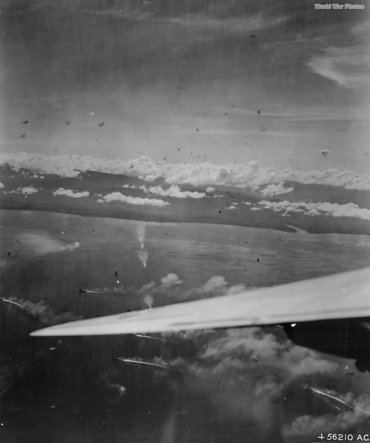 B-24 of 307th and 5th BG escorted by P-38s attack ships of the Japanese fleet in Brunei Bay Harbor 1944