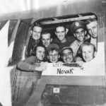 Crew of B-24D 41-24183 „The Goon” lean from the waist gun hatch upon return to their base in China 1943