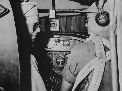 US pilot and Chinese Co-Pilot in cockpit of B-25 ’44