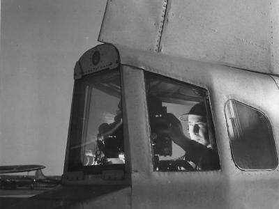B-29 tail gunner with remote control gun sight