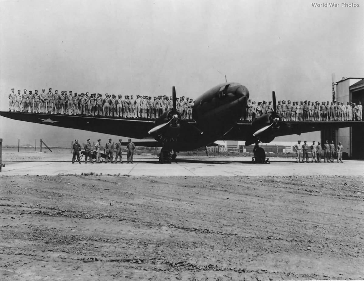 100 soldiers on wings of C-46 1943
