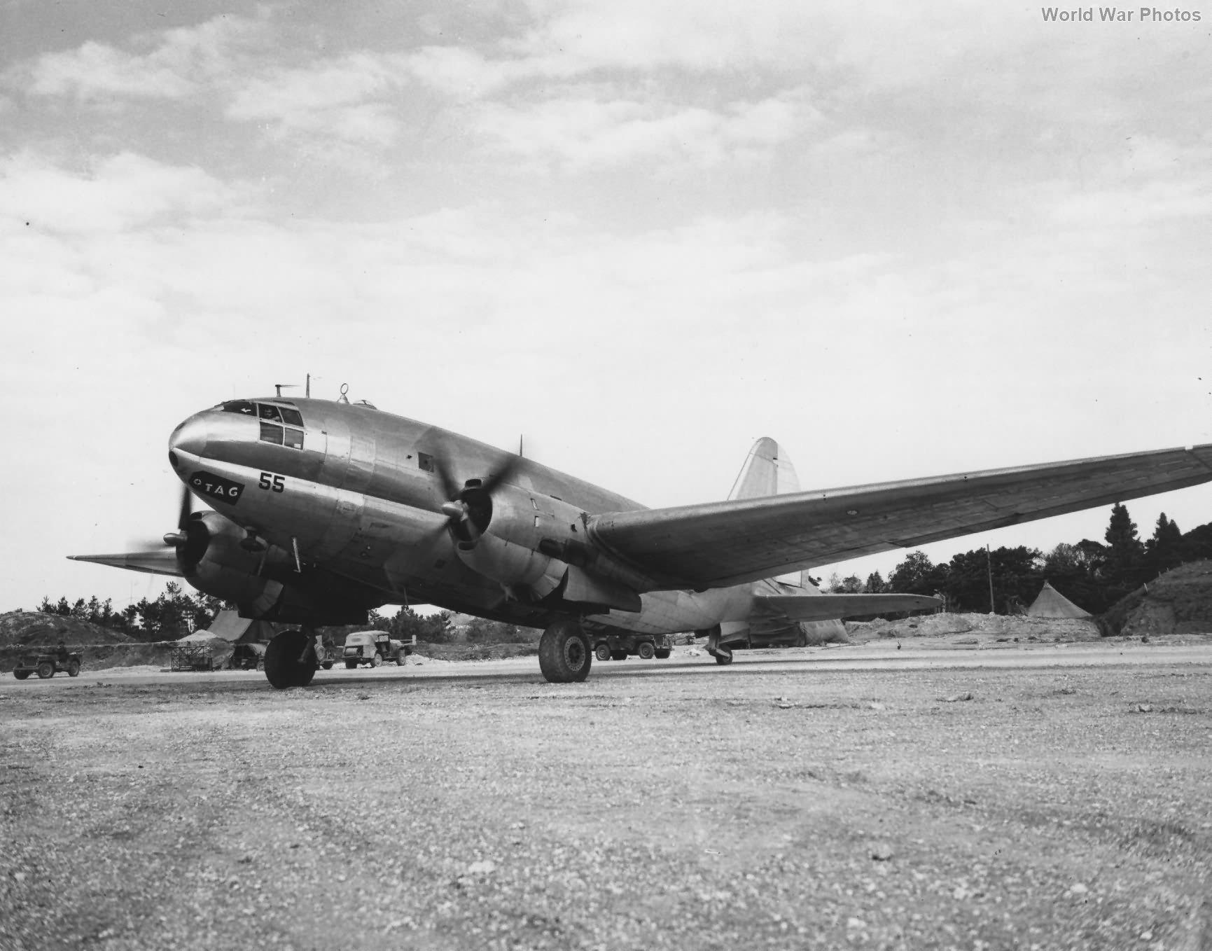 Curtiss R5C of VMR-952 taxis on the runway at Yontan Okinawa in April 1945