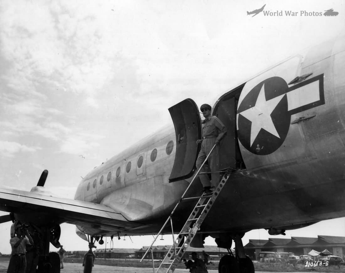 General MacArthur leaves his plane to step onto Japanese soil at Atsugi Airport