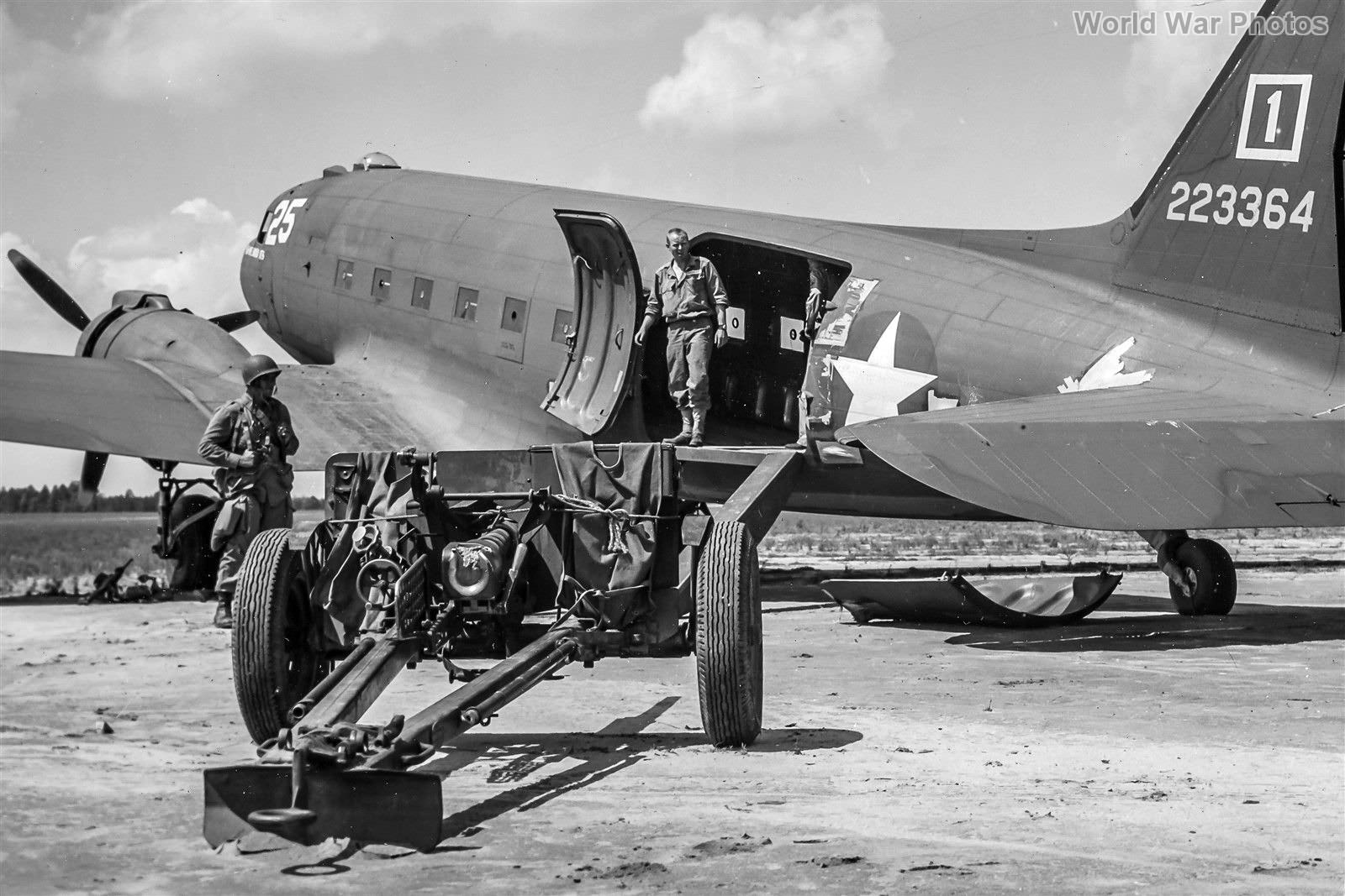 101st AD preparing to load a 57mm AT into C-47
