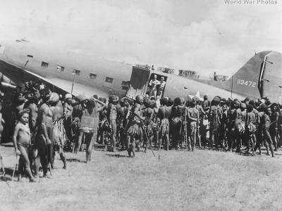 Natives Inspect plane in New Guinea
