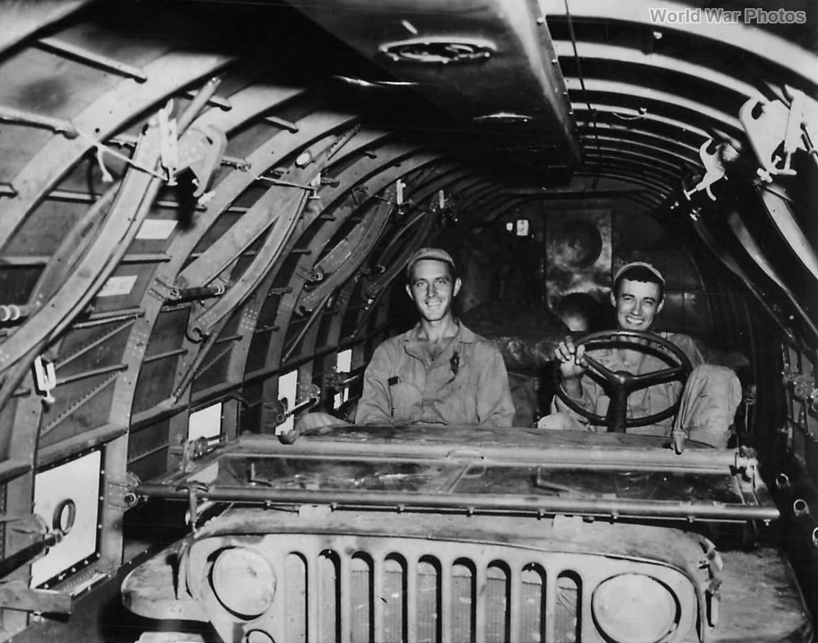 Soldiers Sit in Jeep aboard C-47