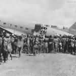 Natives Inspect plane in New Guinea