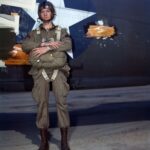 Paratrooper with full equipment in front C-47