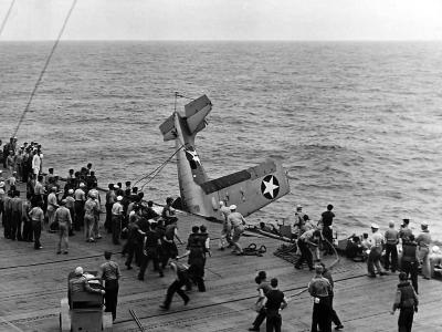 Aircraft Carrier Crash Crew Rescues F4F Wildcat after bad landing