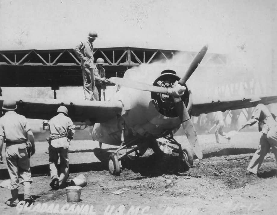 Burning F4F-4 at Henderson Field