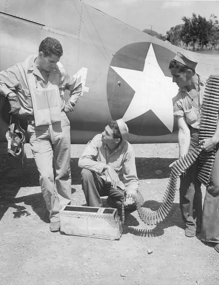 F4F USMC Ace Joe Foss and Crew Loads Ammo on His Plane