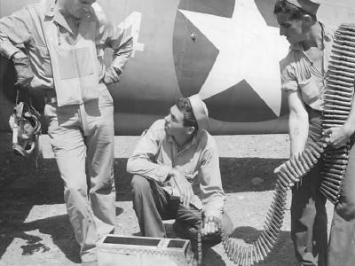 F4F USMC Ace Joe Foss and Crew Loads Ammo on His Plane