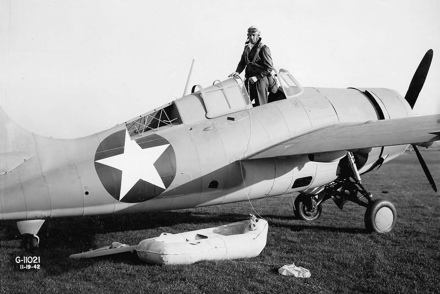 F4F Wildcat Grumman test pilot Corwin Meyer demonstrating the deployment of the pilots life raft 19 November 1942