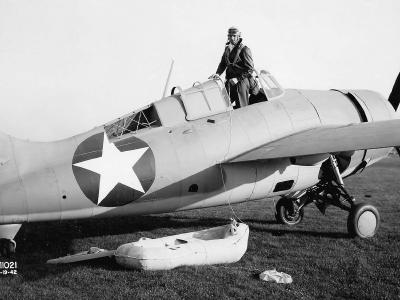F4F Wildcat Grumman test pilot Corwin Meyer demonstrating the deployment of the pilots life raft 19 November 1942