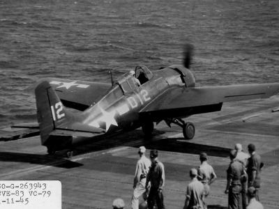 FM-2 Wildcat code D12 of VC-79 on the the flight deck of the escort carrier USS Sargent Bay CVE-83 – 11 January 1945