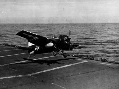 FM-2 Wildcat of VC-70 attempting to trap on the flight deck of the escort carrier USS Salamaua CVE-96 – 7 September 1945
