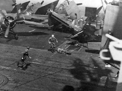 Crewmen on carrier knocked down by runaway Wildcat 1945 1