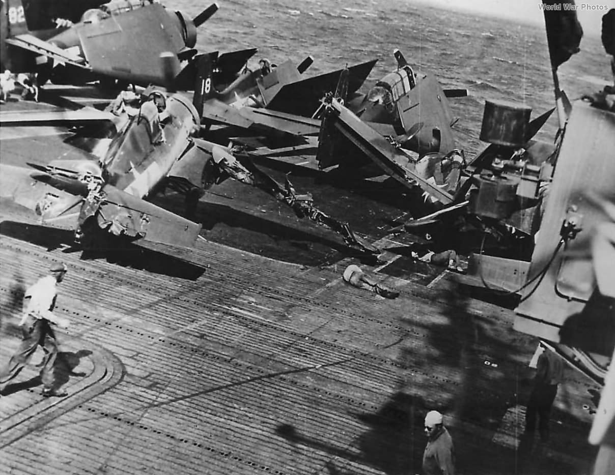 Crewmen on carrier knocked down by runaway Wildcat 1945 3