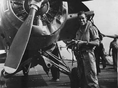 RN Reserve Pilot by F4F after cutting top off tree ’44