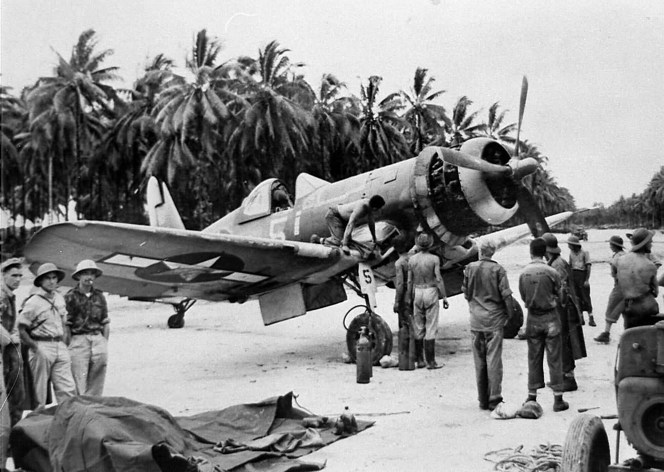 F4U-1A Corsair 5 of VF-17 maintenance at an airfield in the Solomon Islands on March 6 1944