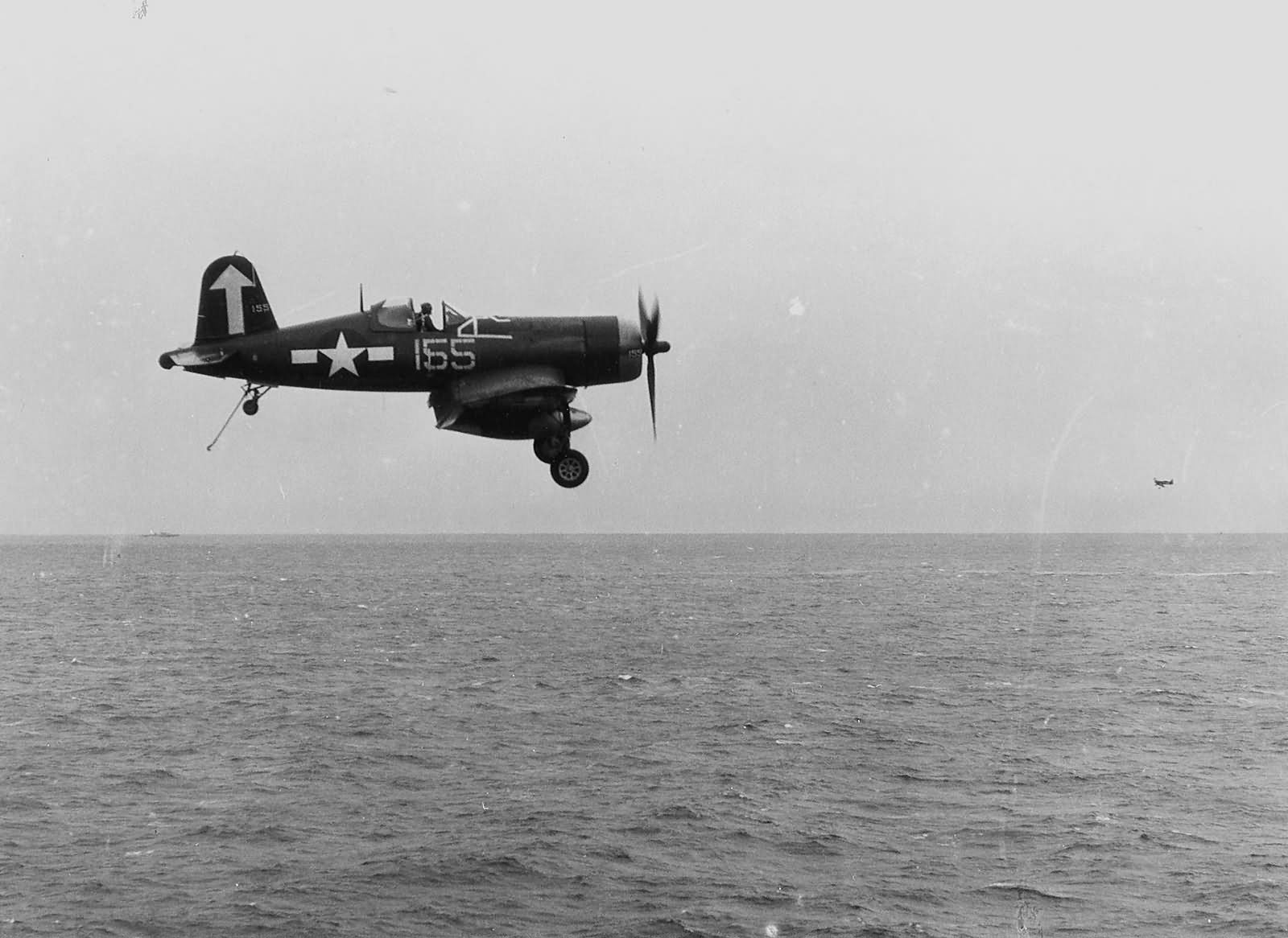 F4U-1D Corsair 155 of VF-84 on approach to the carrier USS Bunker Hill CV-17 on February 16, 1945