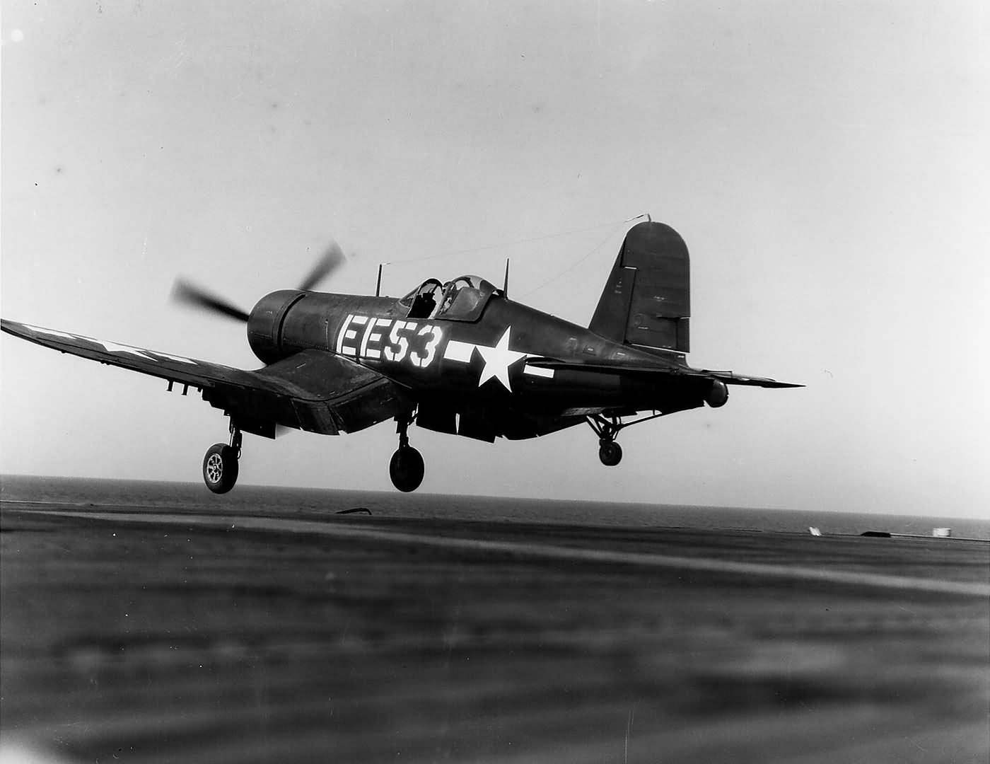 F4U-1D Corsair code EE53 of VMF-512 launches from the escort carrier USS Gilbert Islands CVE-107 on March 6, 1945