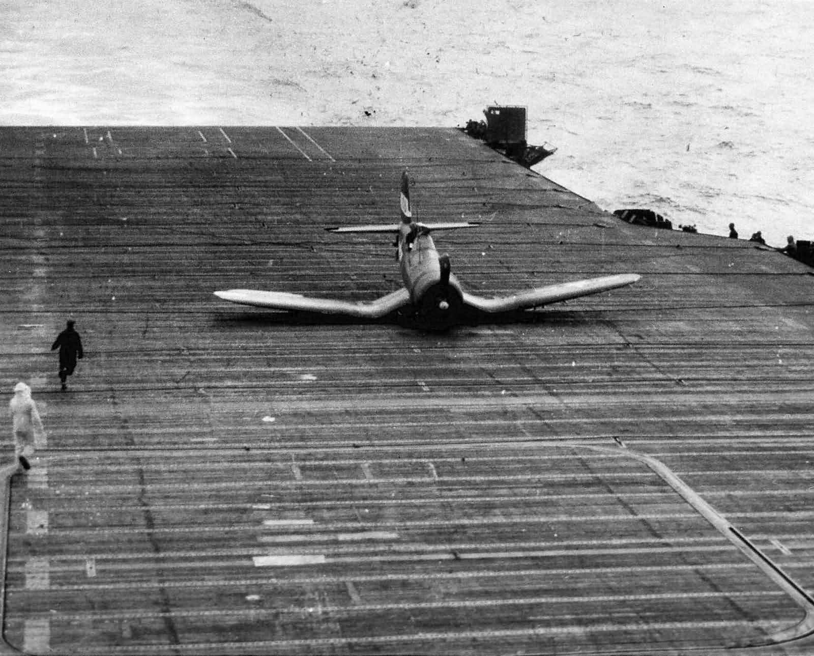 F4U-1D Corsair makes belly landing on the flight deck of the carrier USS Wasp CV-18 – Chichi Jima February 18, 1945
