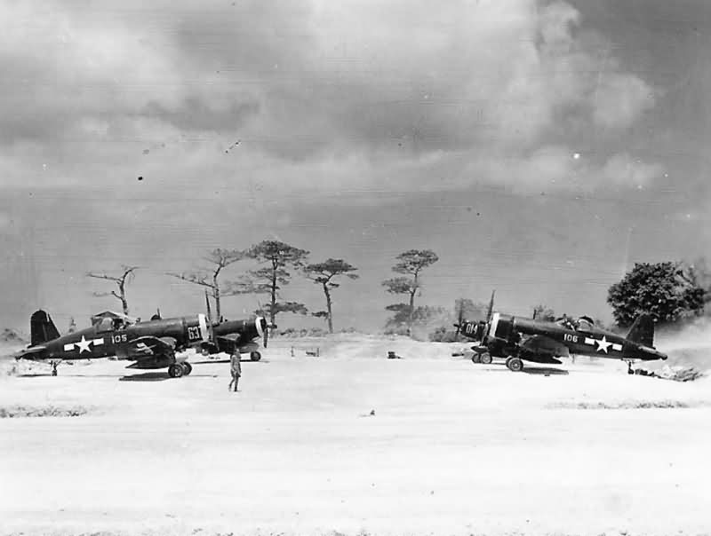 F4U Corsairs #105 #106 on airstrip