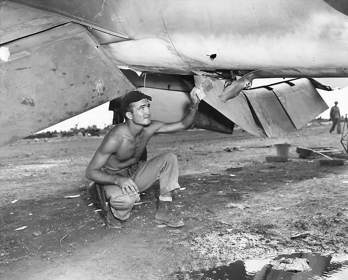 F4U Marine Pilot Lt Lowell Wilkerson Checks Damage to Corsair caused by Human Bomb Guam 1944