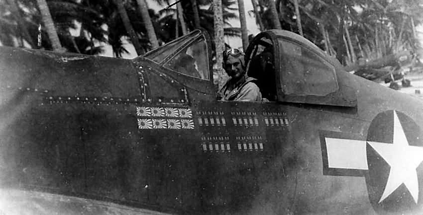 Marine Corps ace Major George Hollowell in the cockpit of F4U Corsair