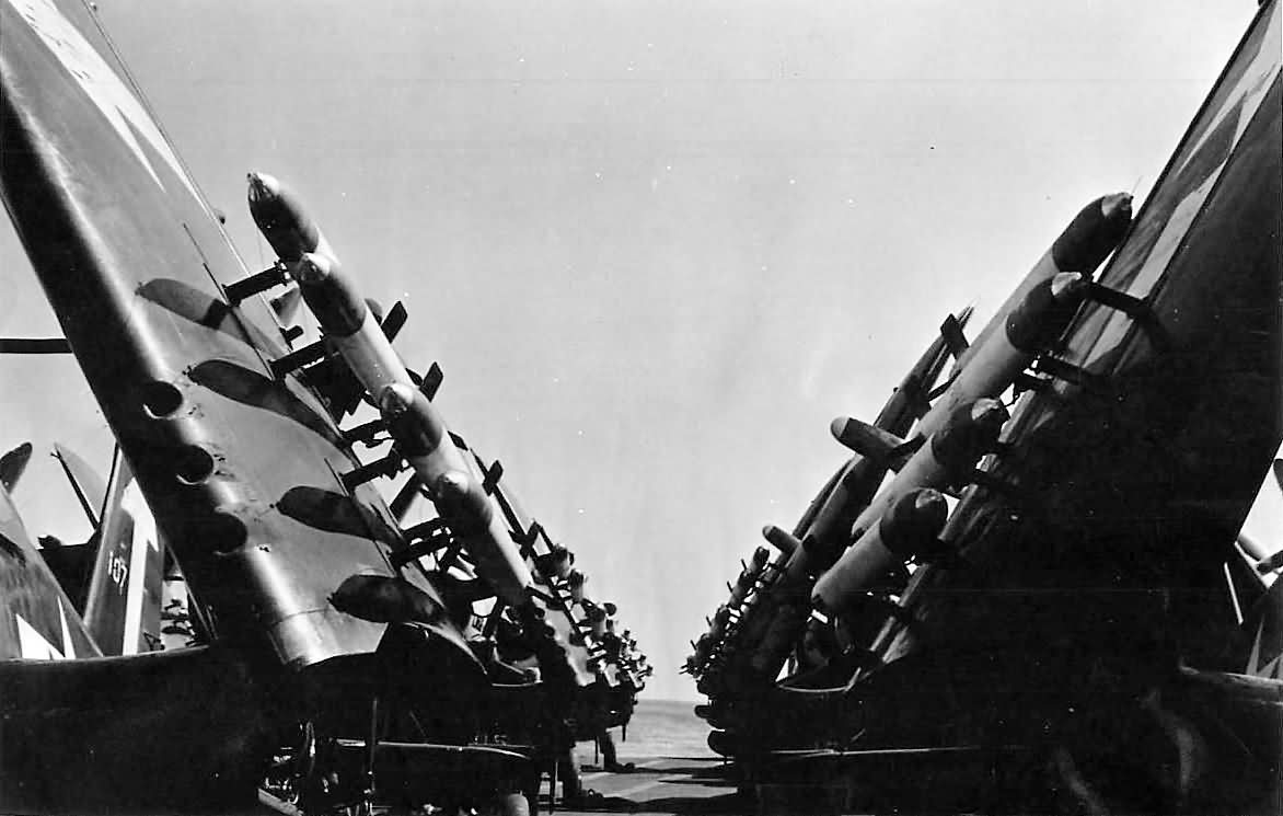 Rocket_Loaded_Wings_of_Vought_F4U-1D_Corsairs_aboard_Aircraft_Carrier_USS_Bunker_Hill_1945.jpg