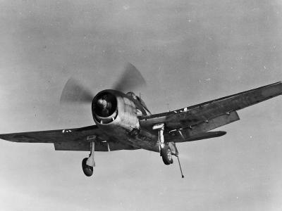 F6F-3 Hellcat 10 of VF-15 on final approach to the escort carrier USS Charger CVE-30 December 13, 1943