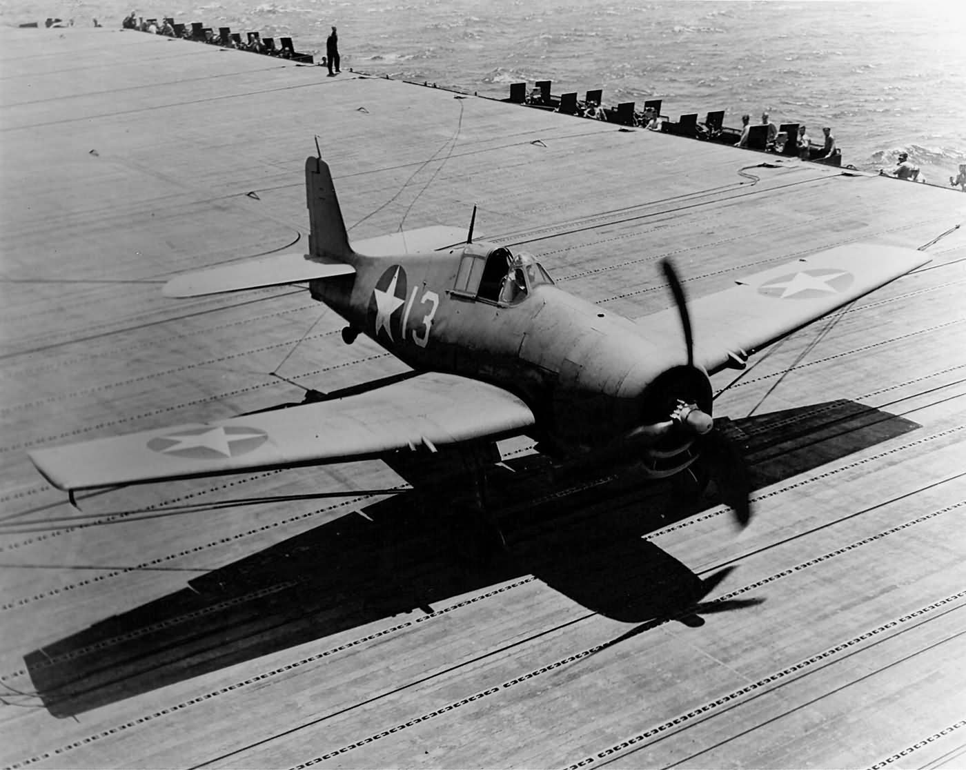 F6F-3 Hellcat #13 of VF-9 engages the barricade on board the carrier USS Essex CV-9 March 25, 1943