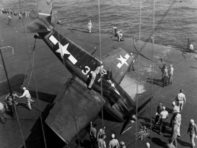 F6F-3 Hellcat #33 of VF-5 on its nose after engaging the barricade USS Yorktown CV-10 March 31, 1944