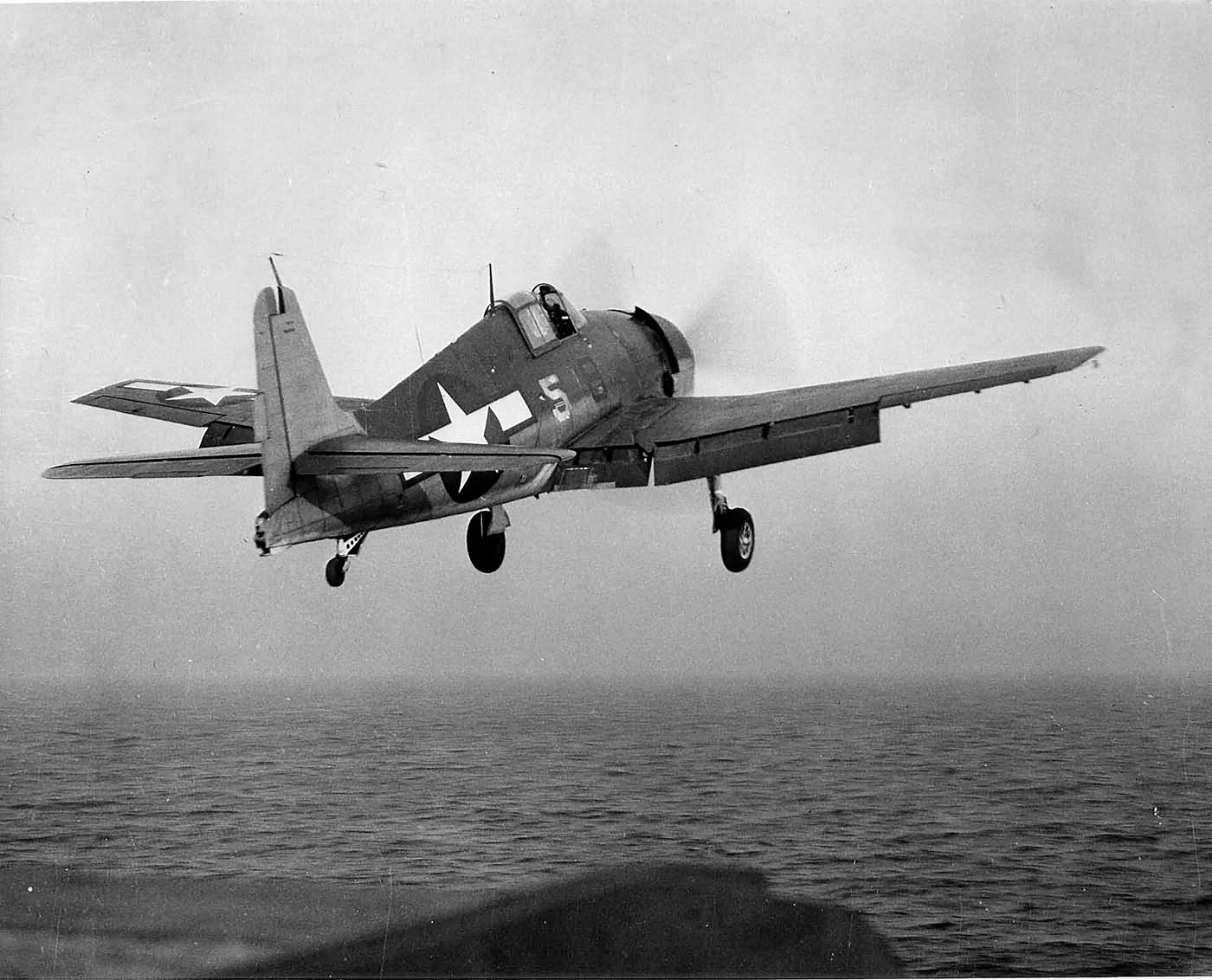 F6F-3 Hellcat #5 of VF-50 after launching from the deck of the carrier USS Bataan CVL-29, January 1944