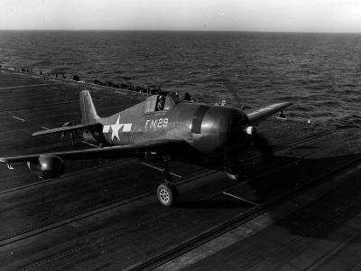 F6F-5N Hellcat 29 of VMF(N)-511 taxiing on the flight deck of the escort carrier Block Island (CVE-106) – February 4, 1945