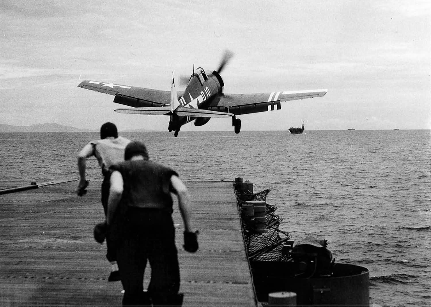 F6F-5 Hellcat D10 of VF-40 launches from the flight deck of the escort carrier Suwanee (CVE-27) August 30, 1945
