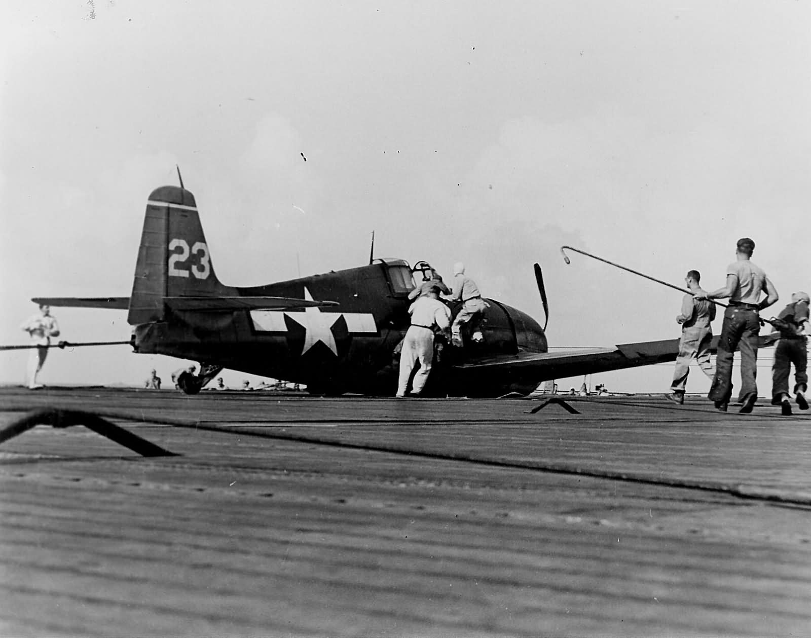F6F-3 Hellcat #23 of VF-15 belly landing on the flight deck of the carrier Essex CV-9 May 23, 1944