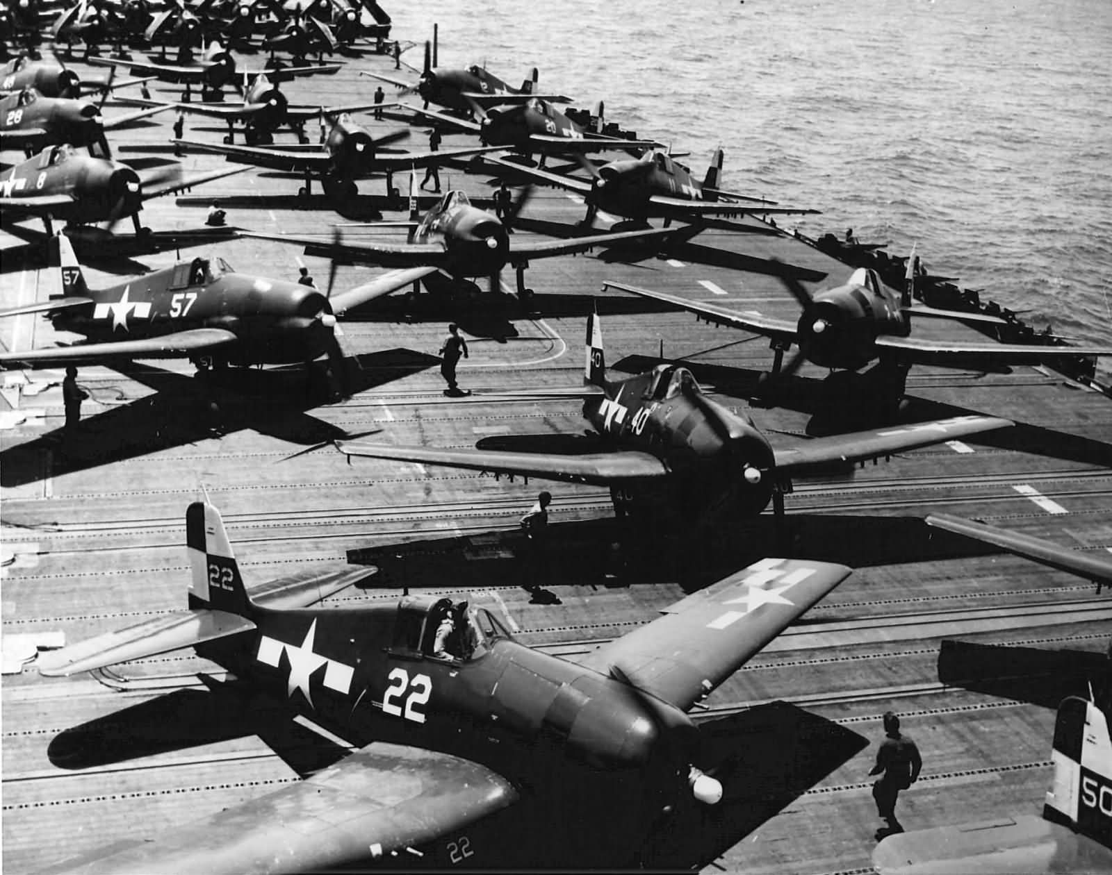 F6F Hellcats of VF 17 and VBF 17 on the flight deck of the aircraft carrier USS Hornet CV 12 March 16 1945