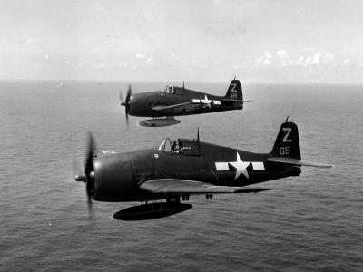 F6F Hellcats #68, #69 of VF-85 USS Shangri-La CV-38 in flight near Japan on August 17, 1945