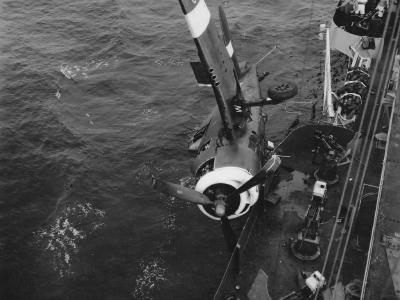 F6F of Fleet Air Arm Hellcat Mk II pushed overboard of HMS Ameer
