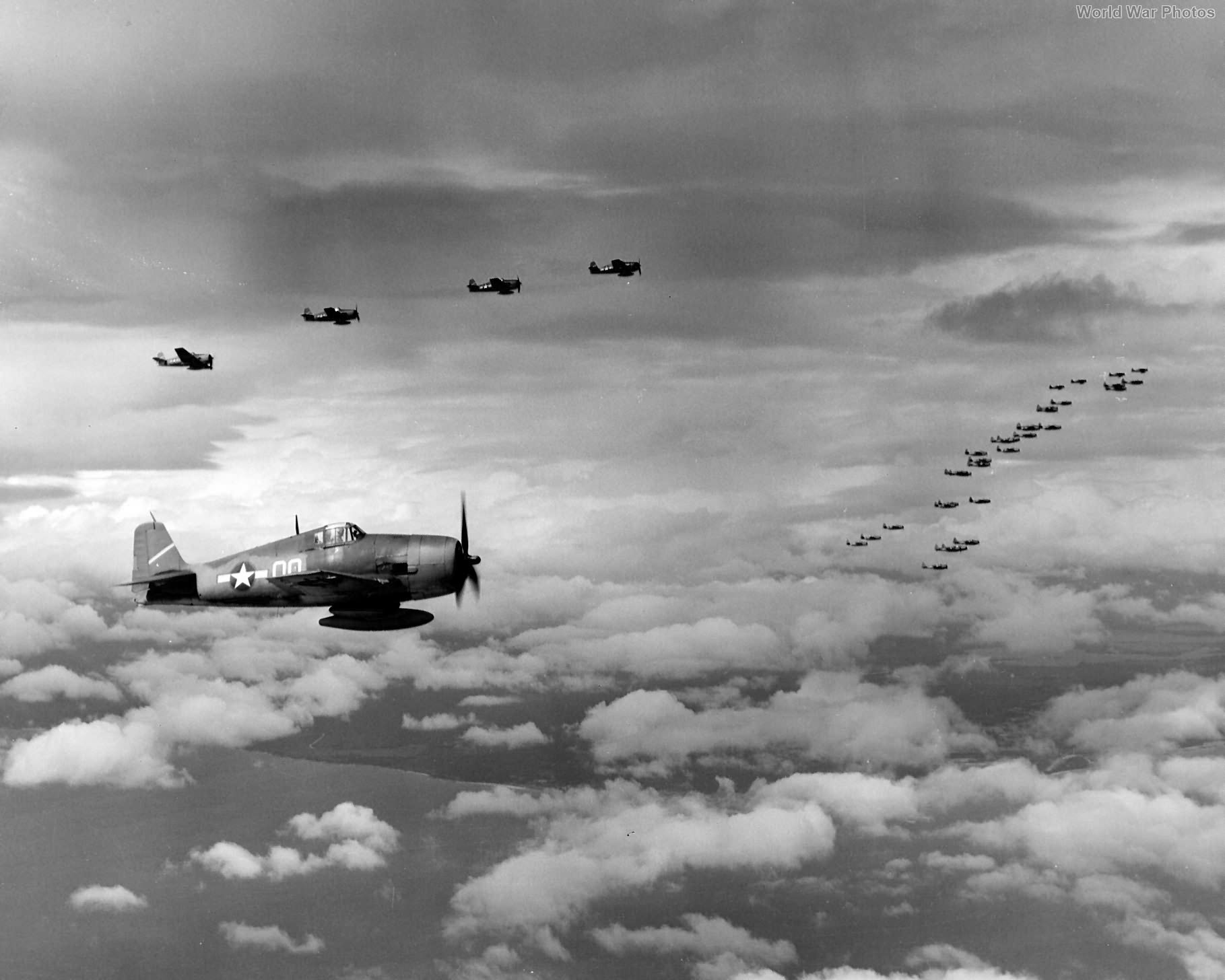 Cmdr Flatley flies F6F-3 00 en route to strike Marcus Island