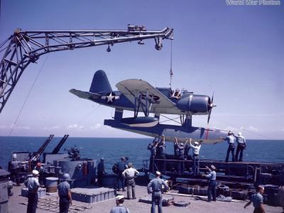 OS2U being hoisted aboard USS Missouri