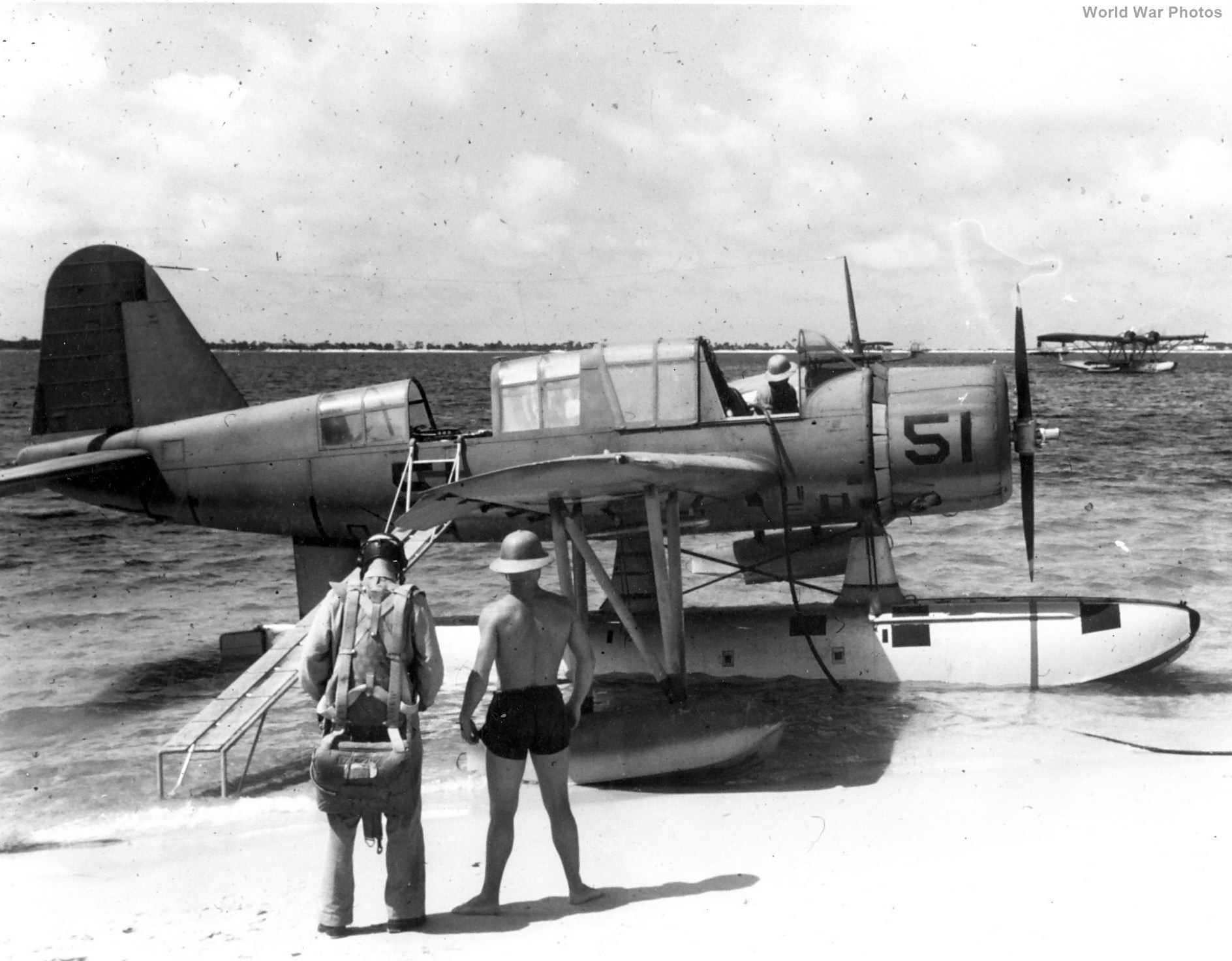 OS2U on the beach at NAS Pensacola awaiting the crew