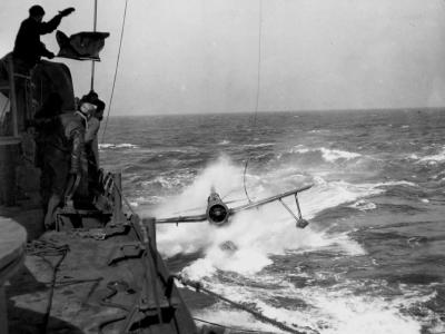OS2U taxis during recovery operations by the USS South Dakota, 1943
