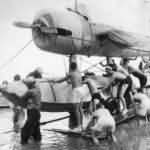 U.S. Sailors with OS2U in South Pacific 1942
