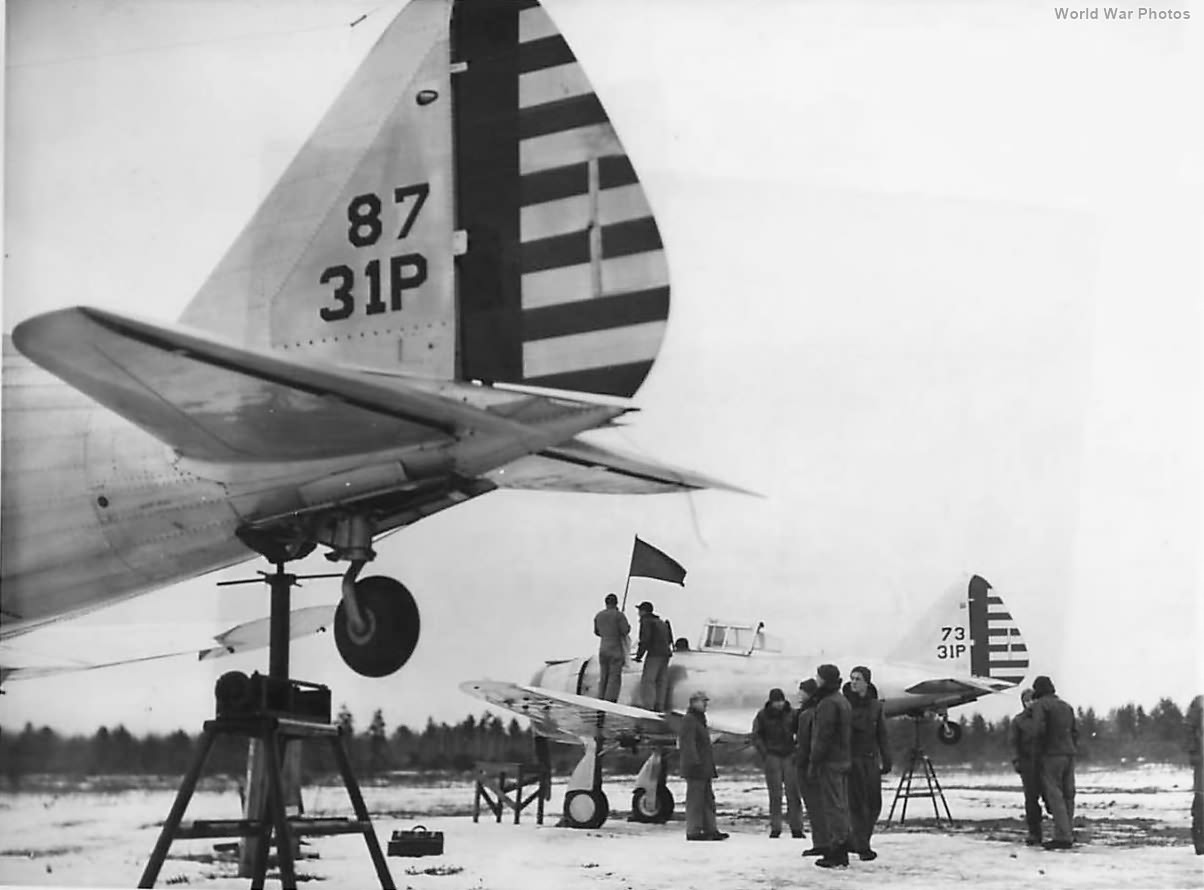 Men of 41st PS sight machine guns on P-35 at Camp Skeel 1940